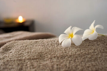 Bett mit Blumen